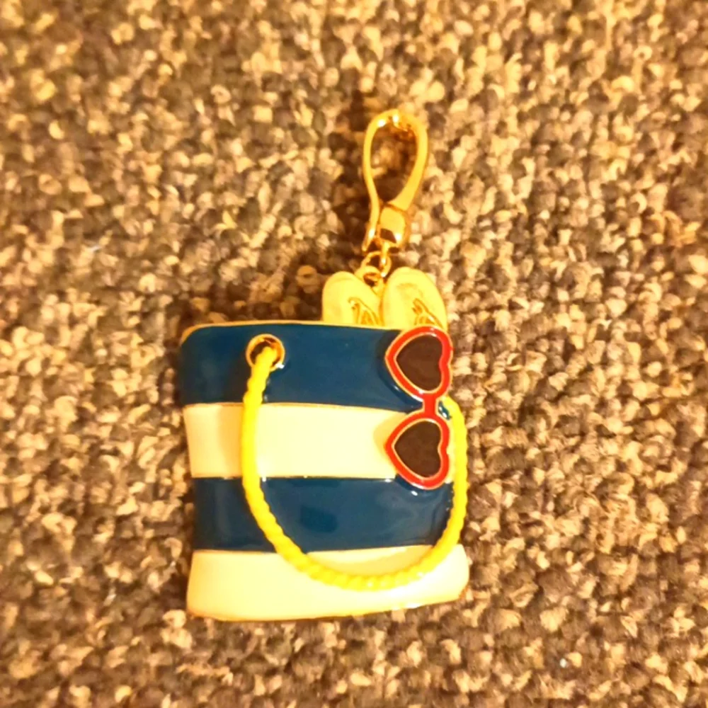 RMN beach bag gold plated keychain